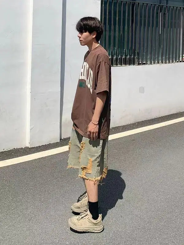 Washed old tassel beggar retro jeans ripped casual centre shorts