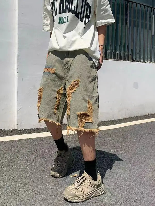 Washed old tassel beggar retro jeans ripped casual centre shorts