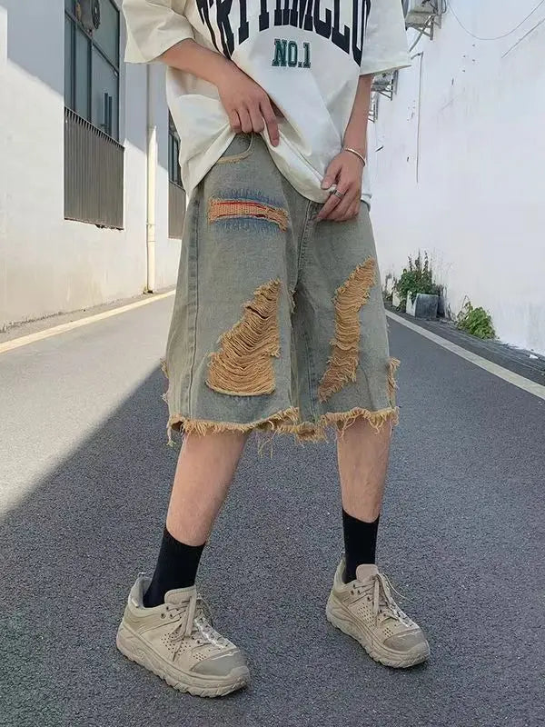 Washed old tassel beggar retro jeans ripped casual centre shorts