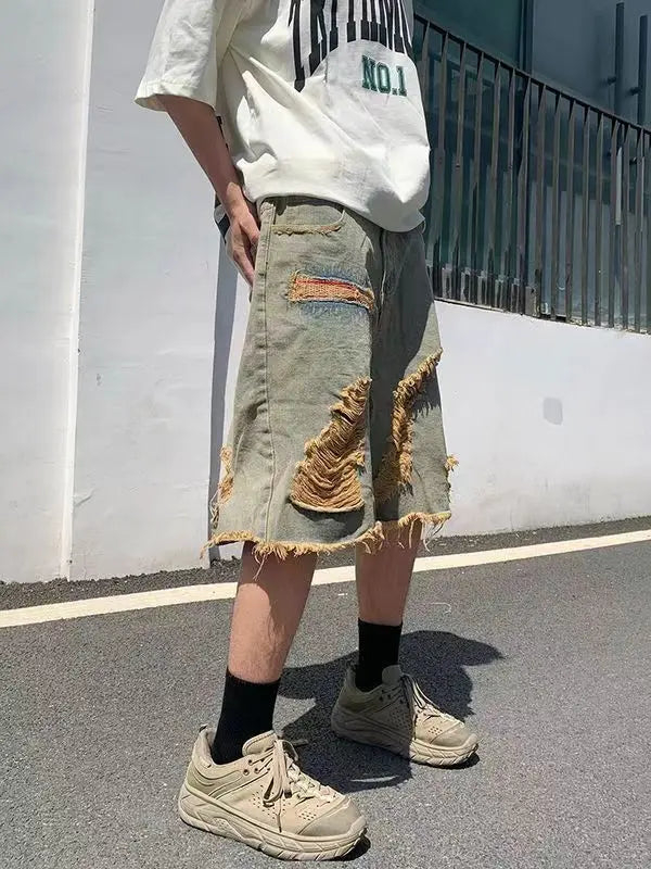 Washed old tassel beggar retro jeans ripped casual centre shorts
