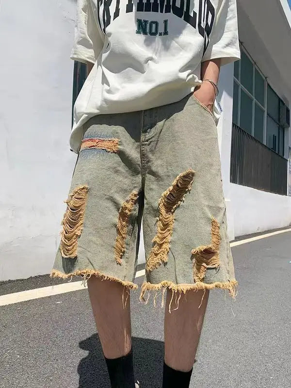 Washed old tassel beggar retro jeans ripped casual centre shorts