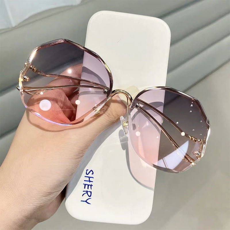 Elevate Your Style with Round Gradient Sunglasses Embrace the Modern Rimless Design