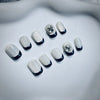 Enchanting Handmade French Tip Press On Nails with Cat Eye Glitte