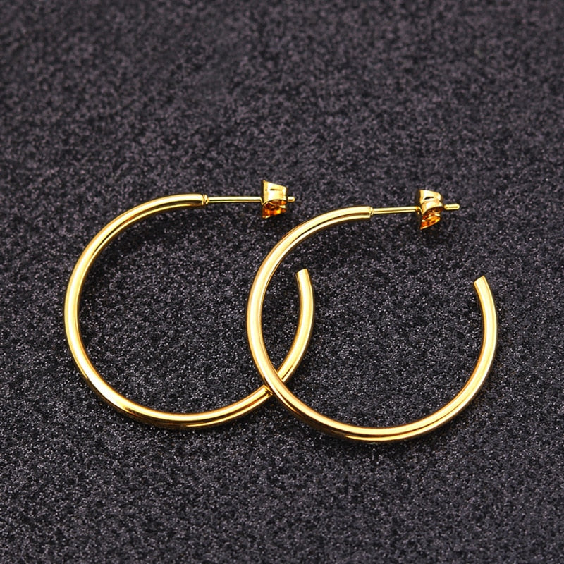 Gold color Perfume women hoop earrings Circular Geometric