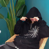 Women's black hoodie with skull print