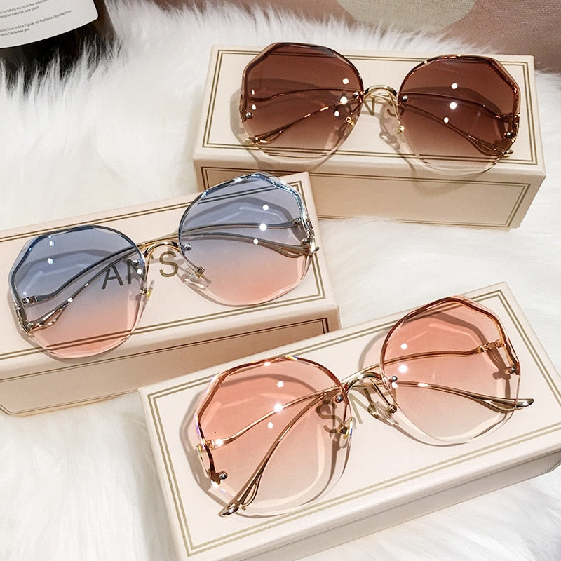 Elevate Your Style with Round Gradient Sunglasses Embrace the Modern Rimless Design